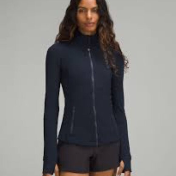 Lululemon Athletica navy
Luon Define
Size 12
Zipup jacket
Thumb holes 
Pockets - Picture 12 of 14